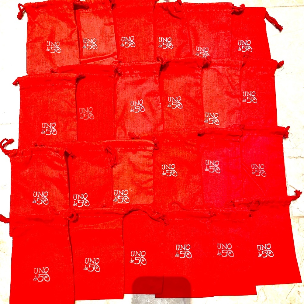 LOT of 24 UNO DE 50 Dust Covers